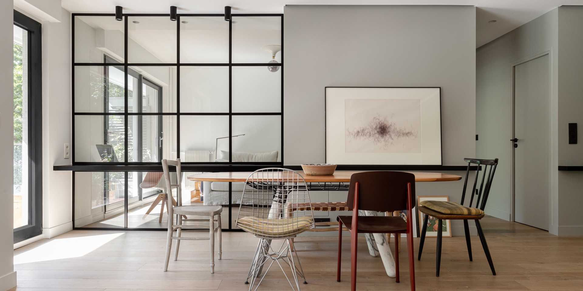 Amenagement d'un appartement des années 70 avec une verrière par un décorateur d'intérieur