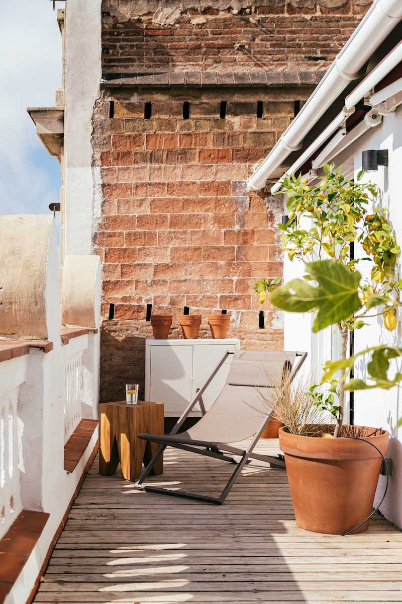 Aménagement d'un toit-terrasse en bois - terrasse côté balcon