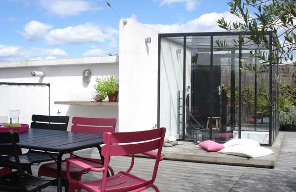 Transformation d'un toit en terrasse végétalisée style Loft par un architece paysagiste à Montpellier