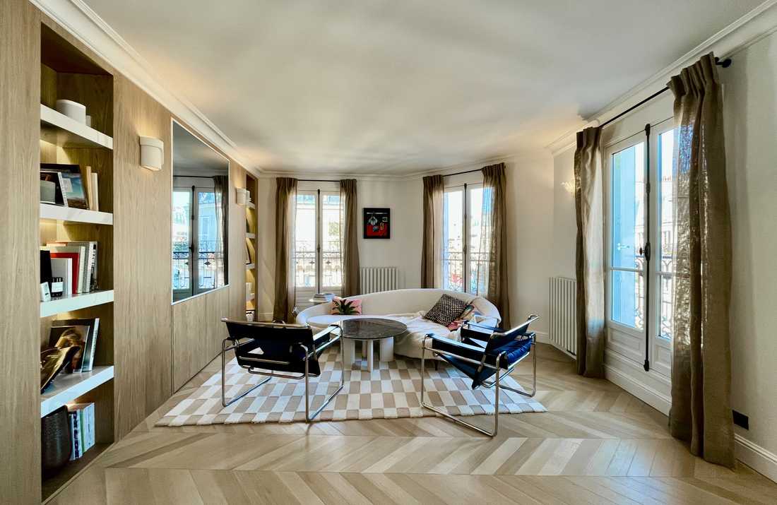 Réunion de deux appartements haussmanniens par un architecte à Paris 